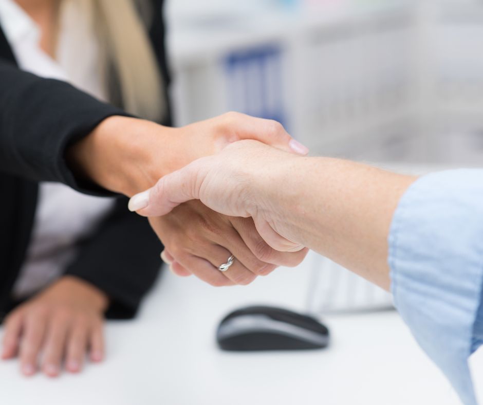 Unternehmensnachfolge hand schütteln Steuerkanzlei Rechner